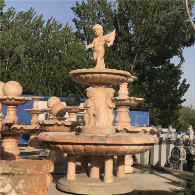 园林户外景观晚霞红石雕西方小天使喷泉雕塑 天使雕塑翅膀精英雪地方法