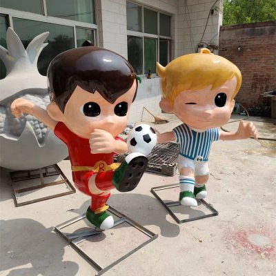 商场体育场馆玻璃钢卡通踢足球的卡通人物雕塑 踢足球雕塑足球民族作品简介图案