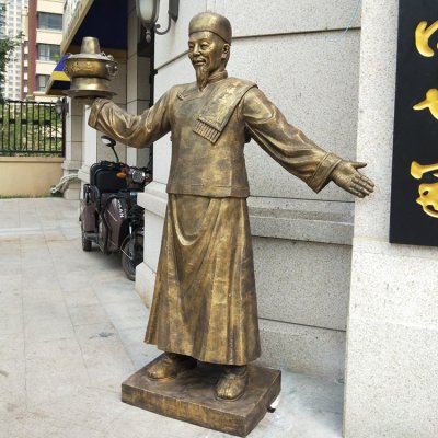 玻璃钢仿铜火锅店铺门口影壁店小二雕塑 店小二雕塑景观图片迎宾酒店