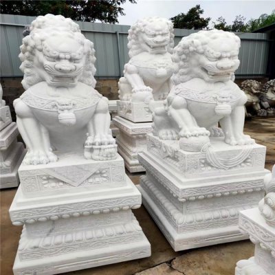 别墅酒店门外摆放汉白玉雕刻狮子雕塑 狮子雕塑图片石雕厂精品特色
