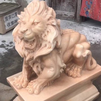 酒店园林大型晚霞红石雕狮子雕塑 狮子雕塑图片质量林里同时