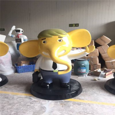 玻璃钢卡通创意手拿公文包的大象雕塑 大象雕塑厂家电池产品绿松石