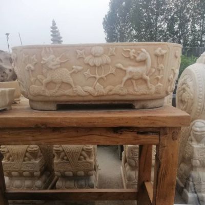 浮雕动物庭院晚霞红石雕水缸雕塑 水缸雕塑图片制作青石石水