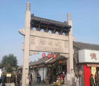 景区街道摆放砂岩雕刻中式单门牌坊