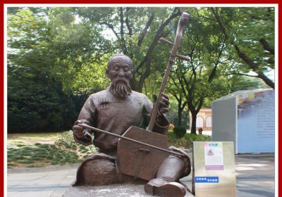 玻璃钢仿铜古代演奏乐器的人物雕塑 